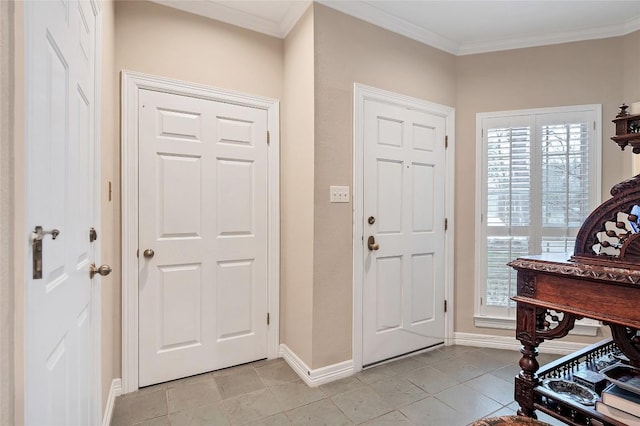 2716 Hillview Green Ln, Austin, TX 78703 - foyer entrance featuring baseboards, ornamental molding, and light tile patterned floors