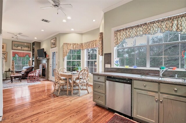 2716 Hillview Green Ln, Austin, TX 78703 - kitchen with dishwasher, ceiling fan, gray cabinets, ornamental molding, and dark countertops