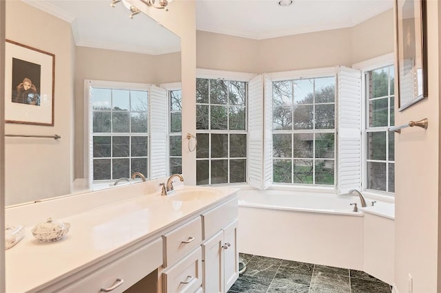 bathroom with vanity, a bathtub, and ornamental molding