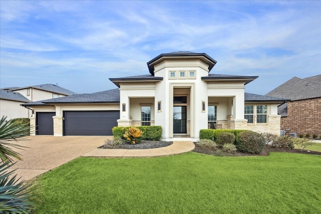 prairie-style house with a front yard and a garage