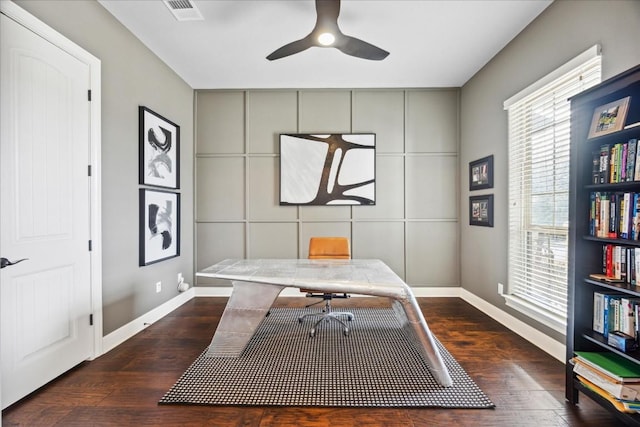 office area featuring ceiling fan and dark wood-type flooring