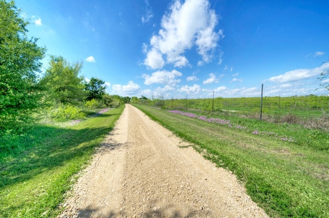 view of road featuring a rural view