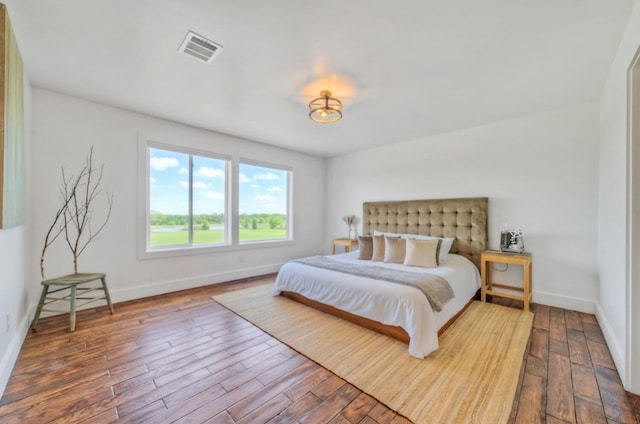 bedroom featuring wood-type flooring