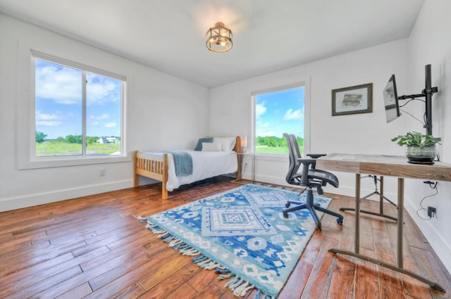 bedroom featuring hardwood / wood-style flooring