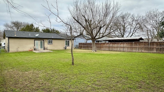 view of yard featuring french doors