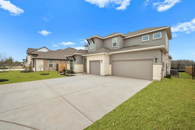 view of front of home with a front yard, a garage, fence, stone siding, and stucco siding