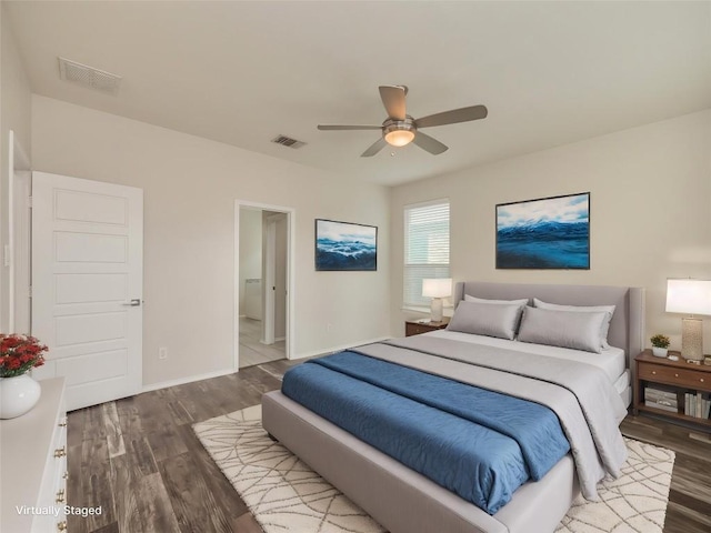 1432 Uhland Dr, Leander, TX 78641 - bedroom featuring wood finished floors, baseboards, and a ceiling fan