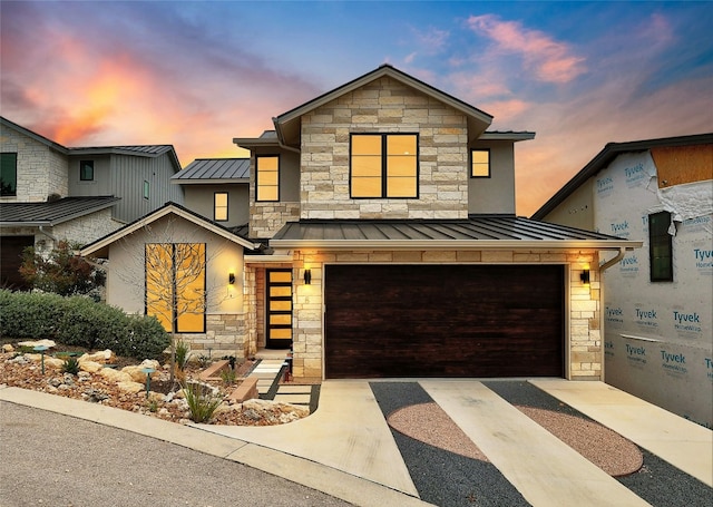 view of front of home with a garage