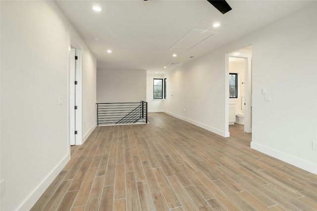 spare room featuring light hardwood / wood-style flooring