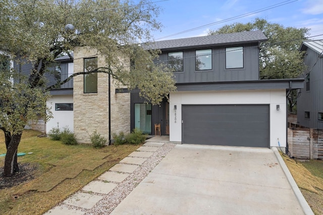 view of front of property featuring a garage