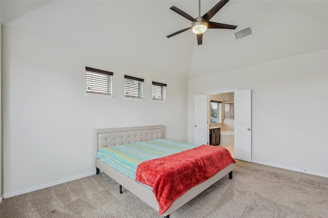 bedroom featuring light colored carpet, visible vents, and multiple windows