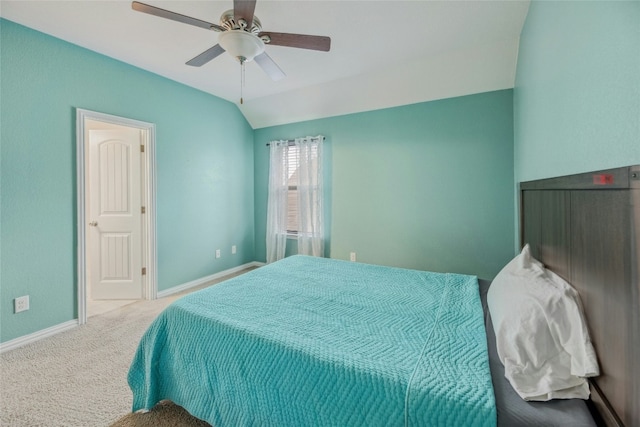 bedroom featuring lofted ceiling, carpet flooring, a ceiling fan, and baseboards