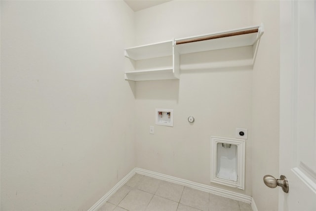 laundry area with washer hookup, light tile patterned floors, hookup for an electric dryer, gas dryer hookup, and laundry area