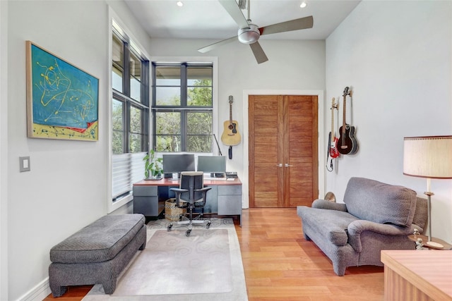 702 Crystal Mountain Dr, Austin, TX 78733 - home office with wood finished floors, a ceiling fan, and recessed lighting