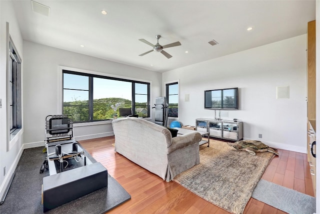 702 Crystal Mountain Dr, Austin, TX 78733 - living room with a ceiling fan, wood finished floors, and recessed lighting