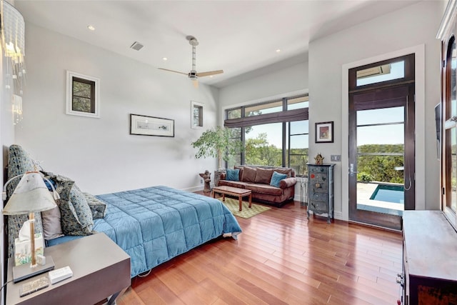 702 Crystal Mountain Dr, Austin, TX 78733 - bedroom featuring access to outside, recessed lighting, wood finished floors, and ceiling fan