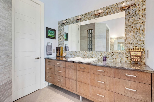702 Crystal Mountain Dr, Austin, TX 78733 - bathroom featuring vanity and decorative backsplash