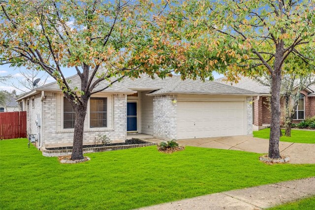 3580 Rock Shelf Ln, Round Rock, TX 78681 - view of front of house featuring an attached garage, concrete driveway, and roof with shingles