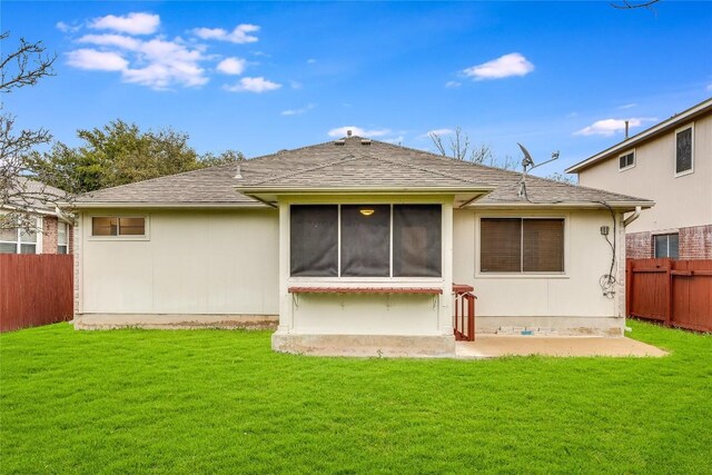 3580 Rock Shelf Ln, Round Rock, TX 78681 - back of house with a fenced backyard, a sunroom, roof with shingles, and a patio area