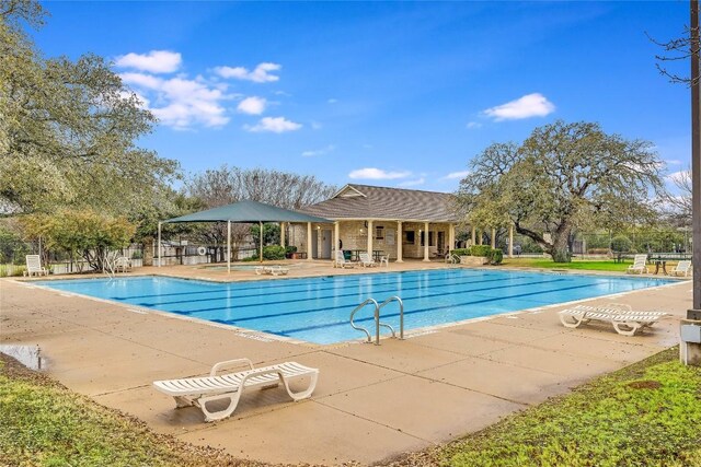 3580 Rock Shelf Ln, Round Rock, TX 78681 - community pool featuring a patio