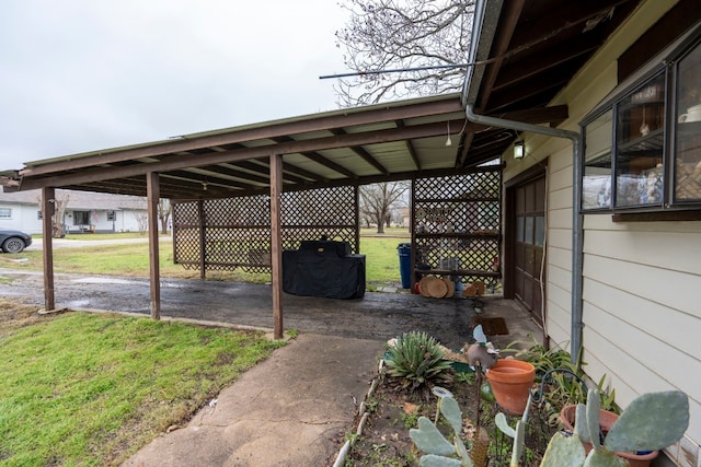 view of patio / terrace featuring a carport