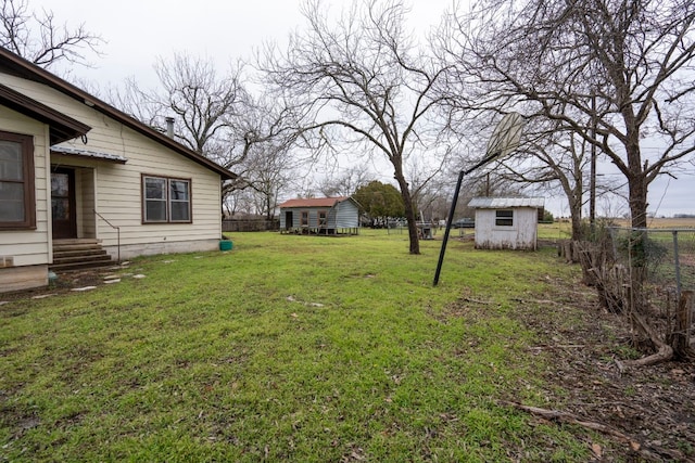 view of yard with a storage shed