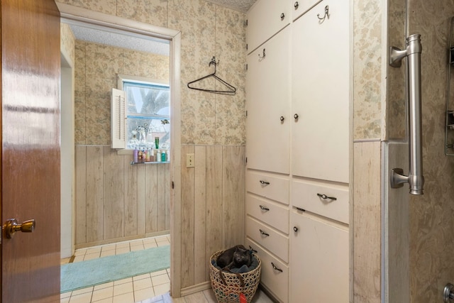 bathroom with tile patterned floors