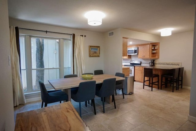 dining space with a wealth of natural light