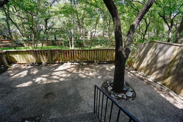 3610 Branigan Ln, Austin, TX 78759 - fenced backyard featuring a patio
