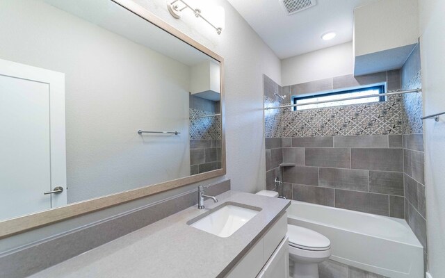 1002 Barrie Dr, Austin, TX 78734 - bathroom with vanity and bathing tub / shower combination