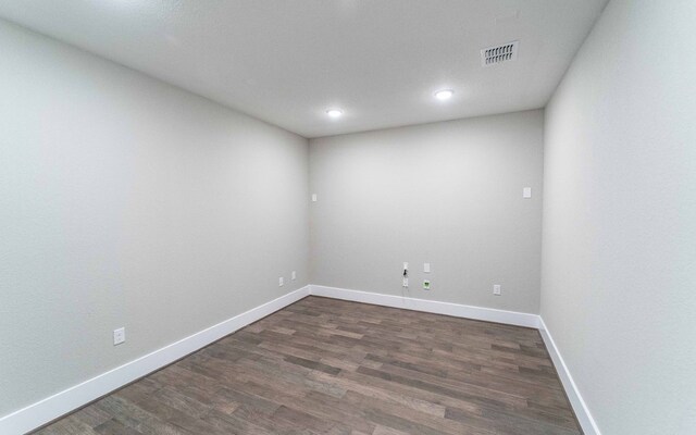 1002 Barrie Dr, Austin, TX 78734 - unfurnished room featuring dark wood-style flooring and recessed lighting