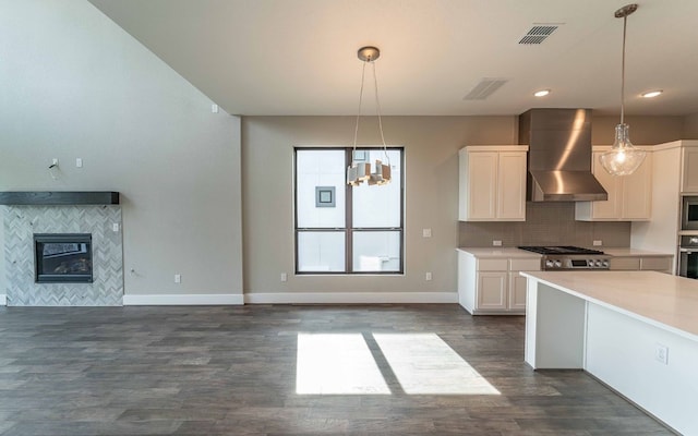 1002 Barrie Dr, Austin, TX 78734 - kitchen with wall chimney exhaust hood, white cabinetry, light countertops, and recessed lighting