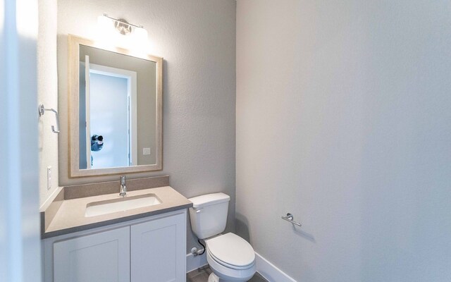 1002 Barrie Dr, Austin, TX 78734 - bathroom featuring toilet and vanity