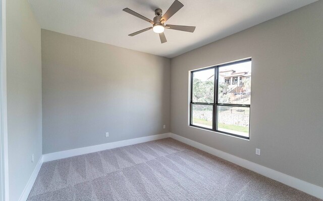 1002 Barrie Dr, Austin, TX 78734 - empty room featuring light colored carpet and ceiling fan