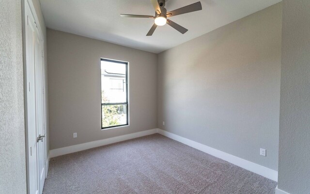 1002 Barrie Dr, Austin, TX 78734 - empty room with ceiling fan and carpet