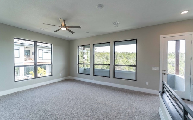 1002 Barrie Dr, Austin, TX 78734 - empty room featuring a ceiling fan, carpet floors, and recessed lighting