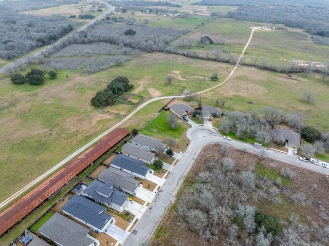 aerial view featuring a residential view and a rural view