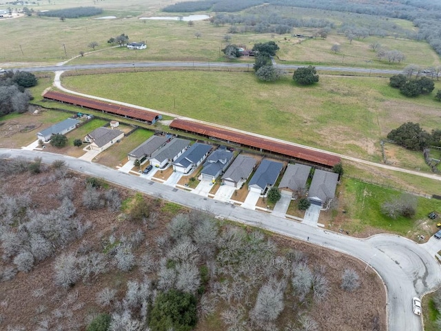 birds eye view of property with a residential view and a rural view