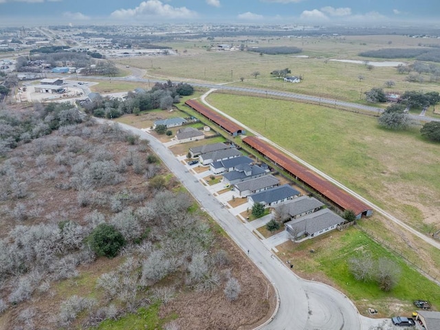 aerial view featuring a rural view and a residential view