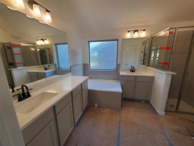 1505 Cole Estates Dr, Georgetown, TX 78628 - bathroom with a shower stall, two vanities, and a bath