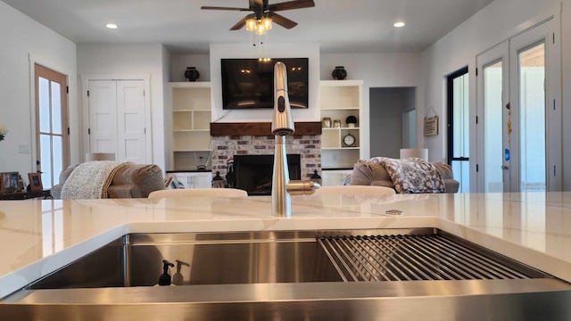 interior space featuring recessed lighting, a healthy amount of sunlight, and open floor plan