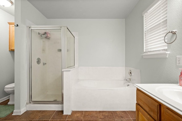 full bathroom featuring vanity, independent shower and bath, toilet, and tile patterned floors