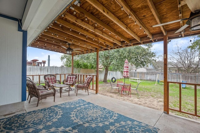 view of patio / terrace with an outdoor living space and ceiling fan