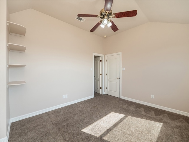 carpeted empty room with lofted ceiling and ceiling fan