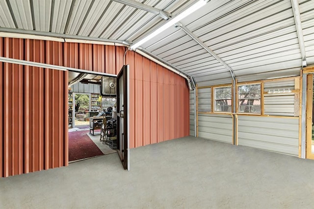 garage featuring a carport