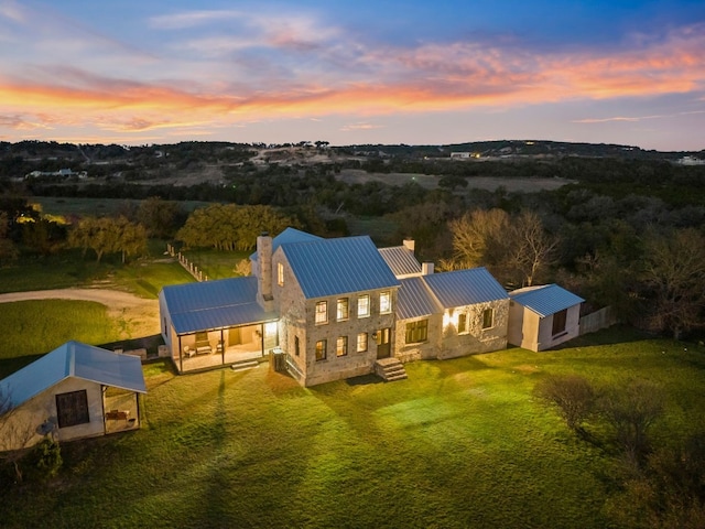 view of aerial view at dusk