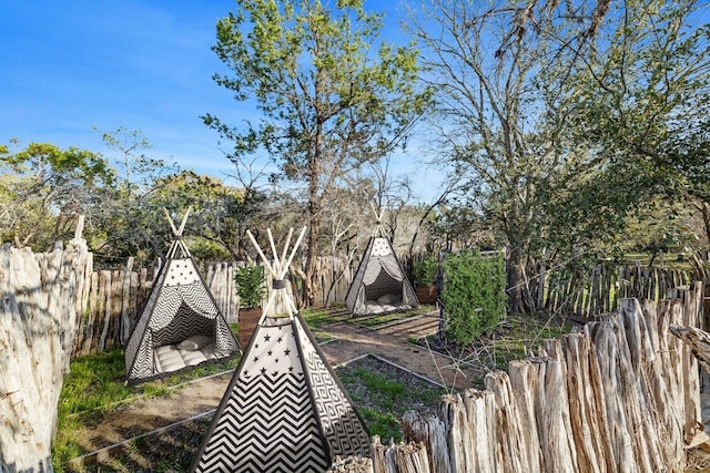 view of yard with fence