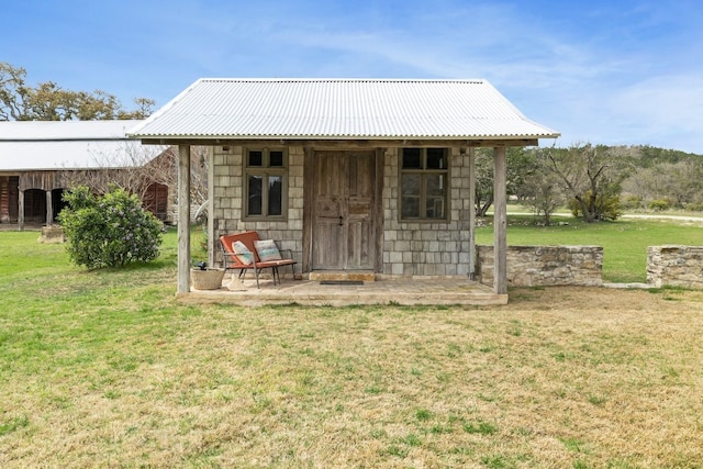 view of outbuilding featuring an outdoor structure