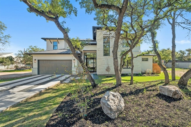 1339 Allen Rd, Austin, TX 78746 - contemporary home featuring concrete driveway, a garage, a standing seam roof, stone siding, and a metal roof