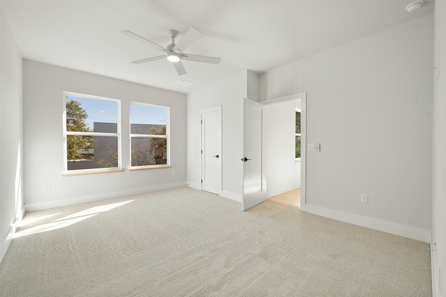 1339 Allen Rd, Austin, TX 78746 - unfurnished bedroom featuring light colored carpet and ceiling fan